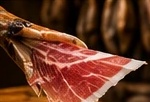 Jamón ibérico affettato a coltello