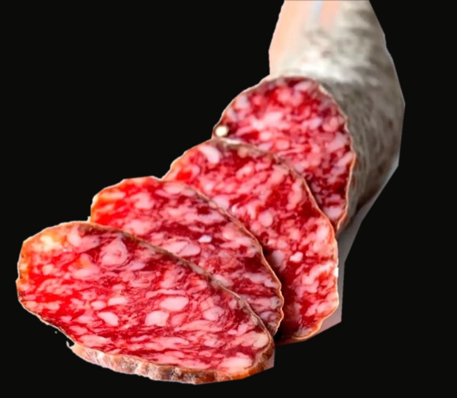 Salchichón ibérico affettato su fondo nero